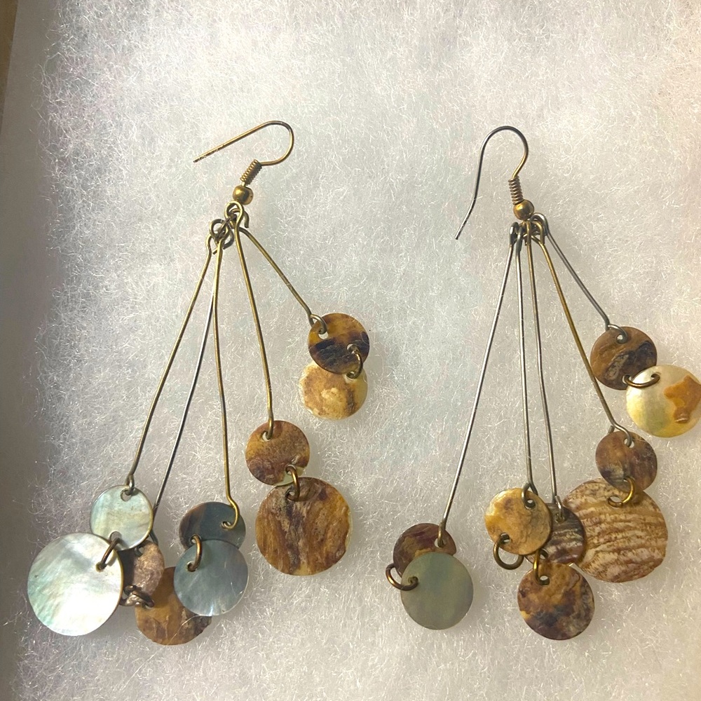 Mixed metal pierced earrings with round hanging shell discs